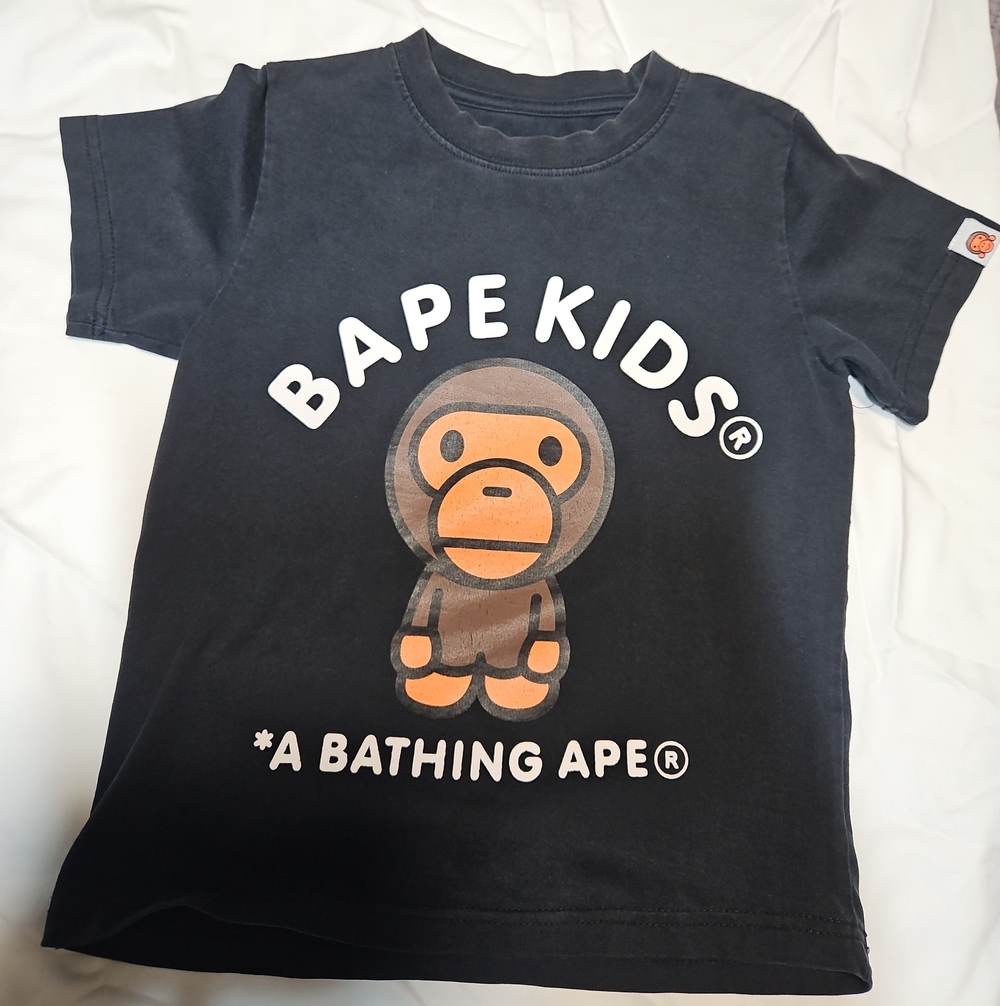 BAPE KIDS Short Sleeve Tee in Black with Orange Ape Graphic